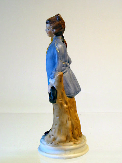 Colonial Boy Porcelain Figurine