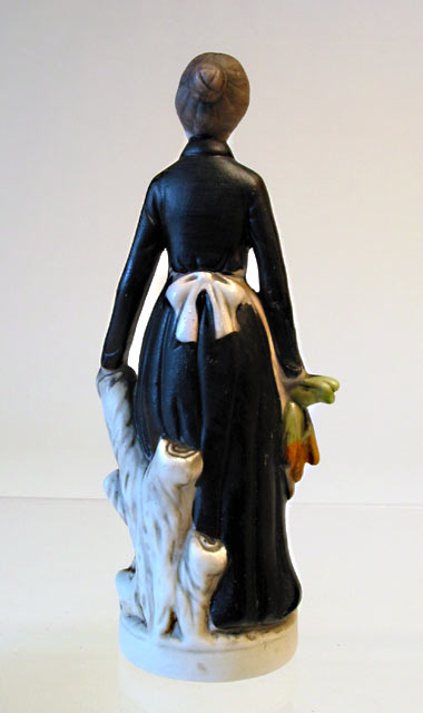 Lady in Apron Porcelain Figurine - Click Image to Close
