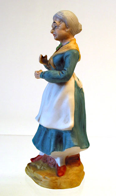 Lady with Plant Porcelain Figurine