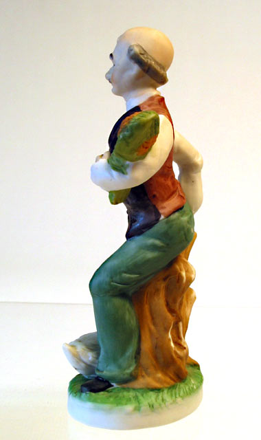 Man with Plant Porcelain Figurine