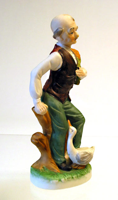 Man with Plant Porcelain Figurine