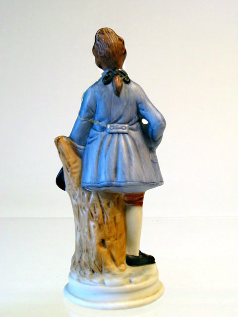 Colonial Boy Porcelain Figurine