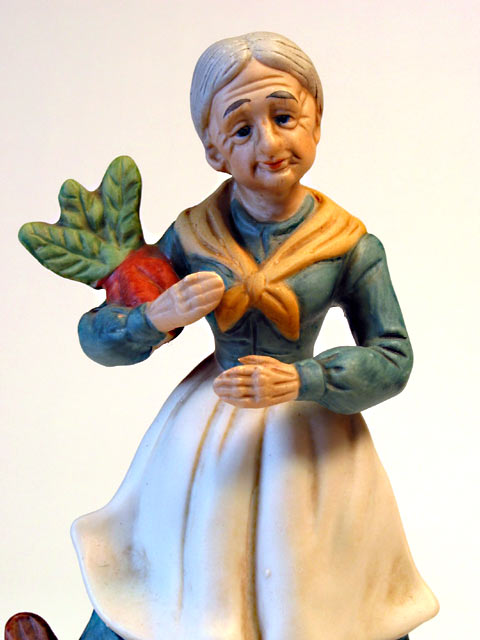Lady with Plant Porcelain Figurine - Click Image to Close