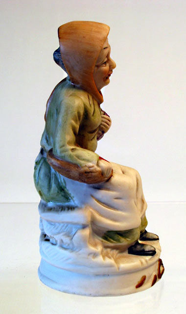 Seated Lady Porcelain Figurine