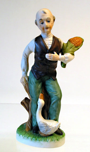Man with Plant Porcelain Figurine - Click Image to Close