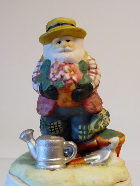 Santa Gardener Musical Porcelain Figurine - Click Image to Close