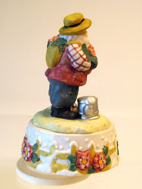 Santa Gardener Musical Porcelain Figurine - Click Image to Close